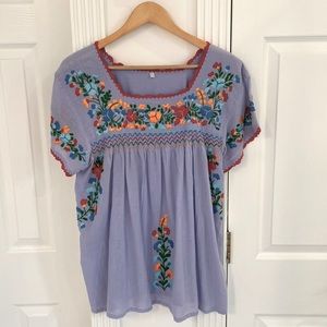 Xochitl hand stitched floral blouse!